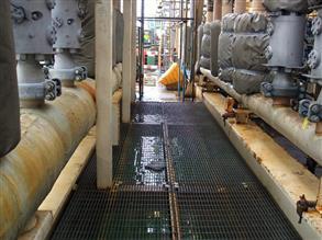 Manifold showing weathering of paintwork on an oil rig